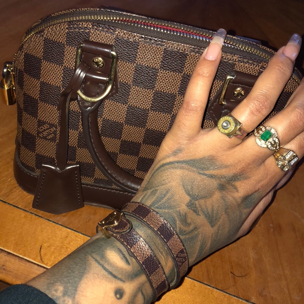 Brown Louis Vuitton with matching bracelet